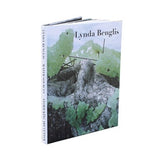 Hard cover book featuring art created by Lynda Benglis.