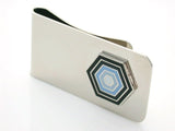 Silver money clip with black/blue honeycomb pattern.