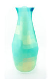 Plastic expandable vase with blue to yellow gradation.